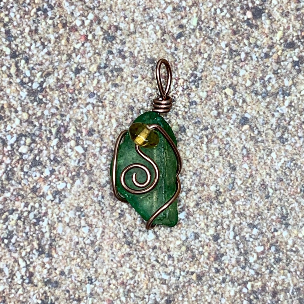 Green beach glass pendant.